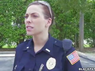 Female cops pull over black suspect and suck his pecker